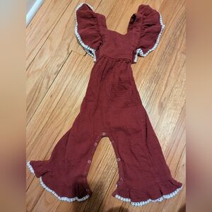 Kate Quinn Ruffle Strap Pom Pom Overall In Dark Cranberry